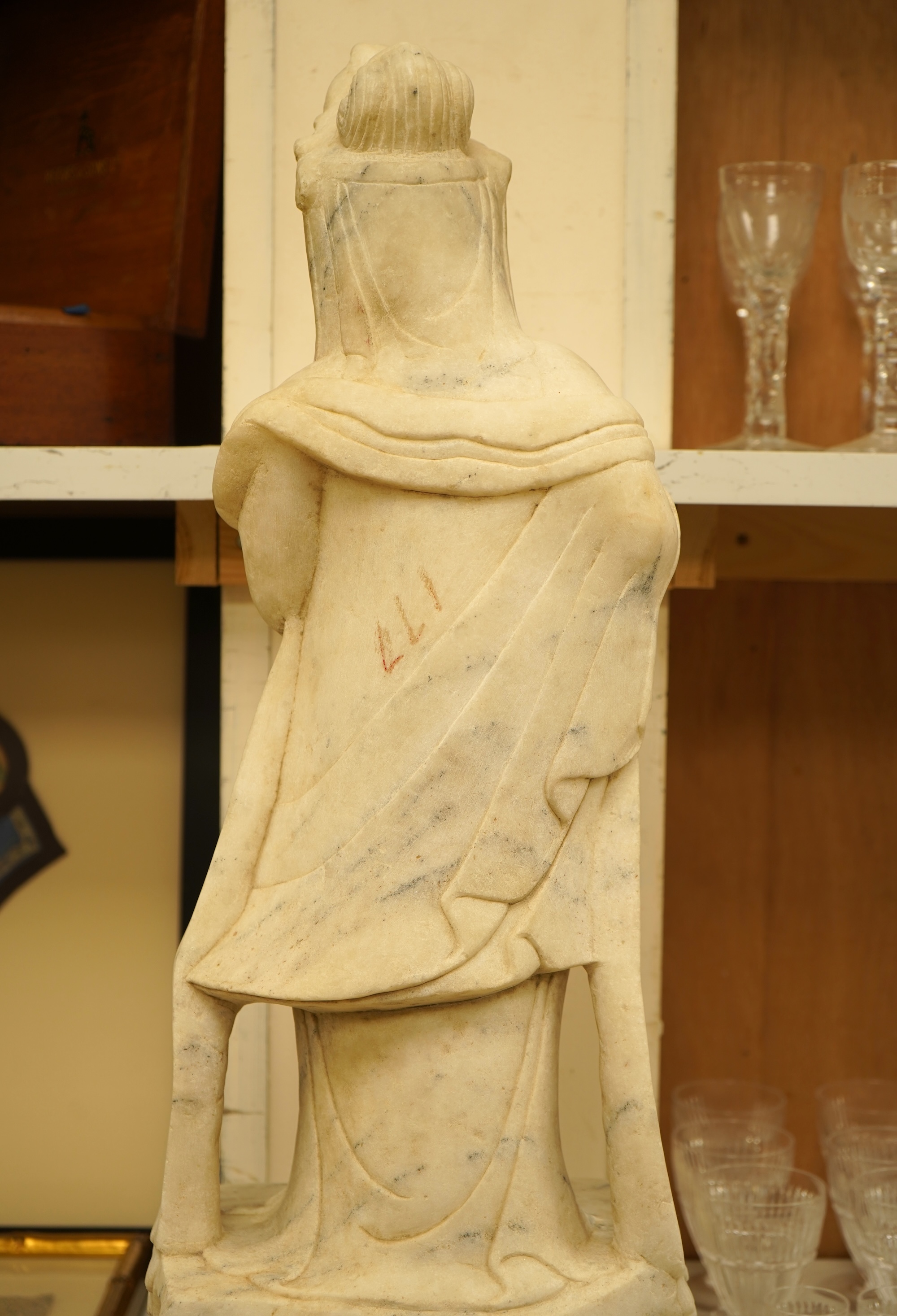 A large Chinese alabaster carving of Guanyin, 66cm high